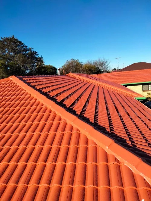 Roof restoration and re-coating on tile roof