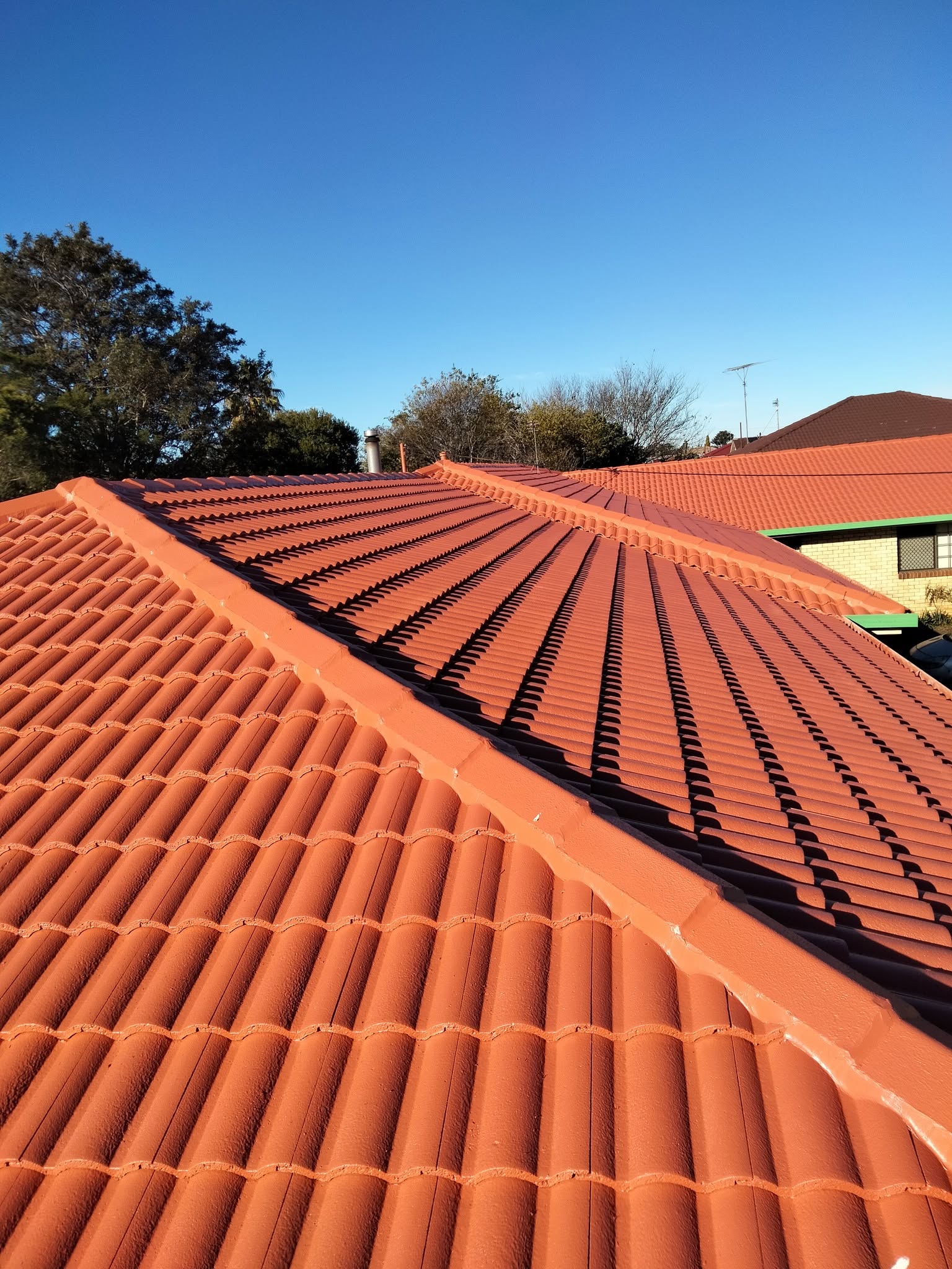Roof restoration and re-coating on tile roof